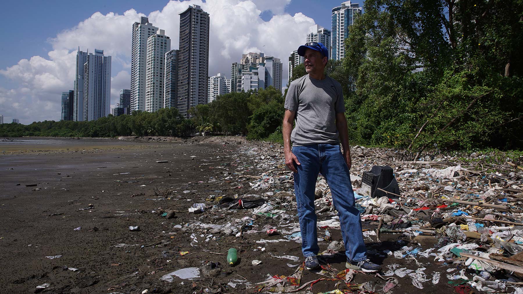Fisk Johnson on plastic covered beach